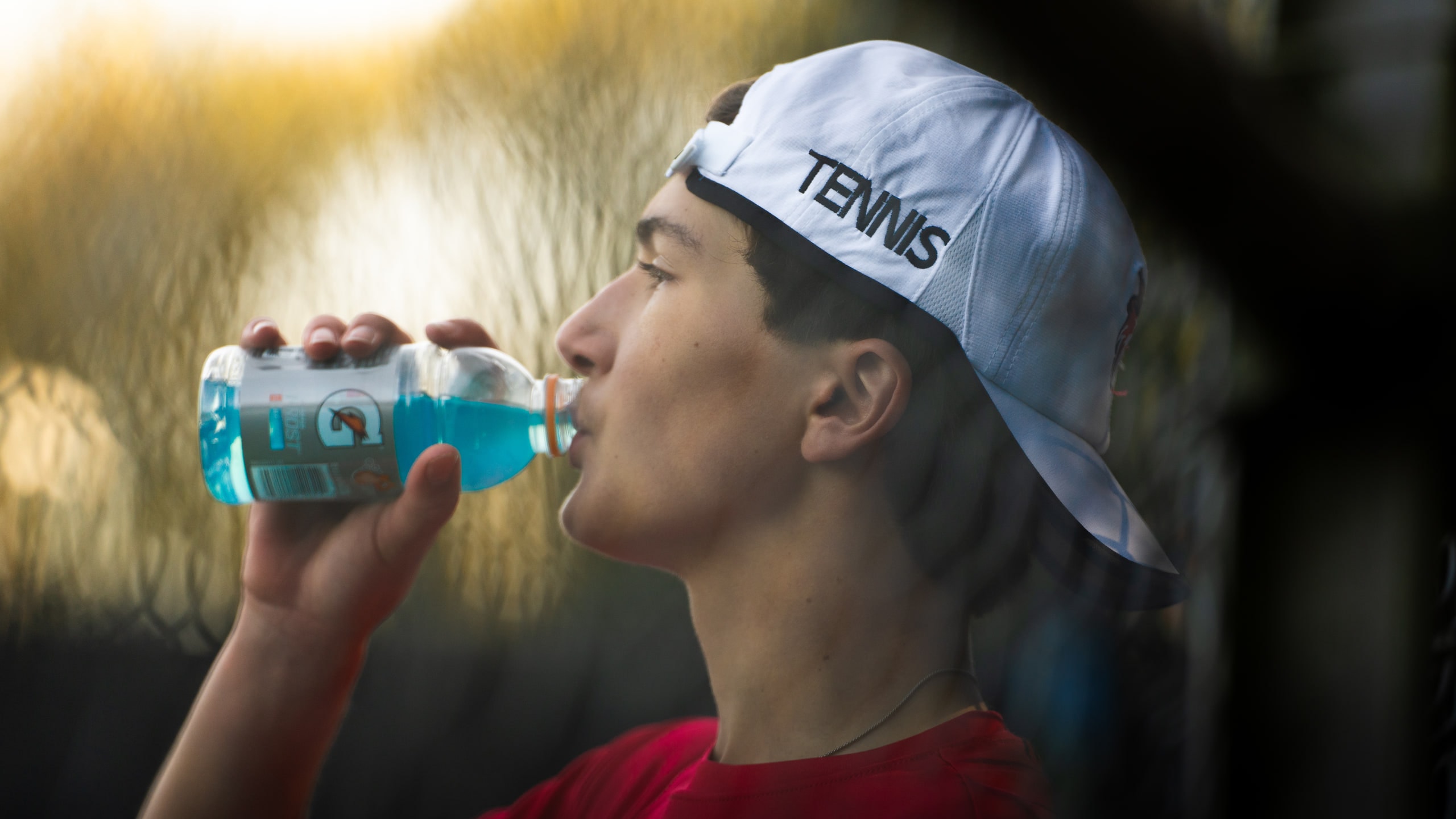 A player drinking from a bottle between games